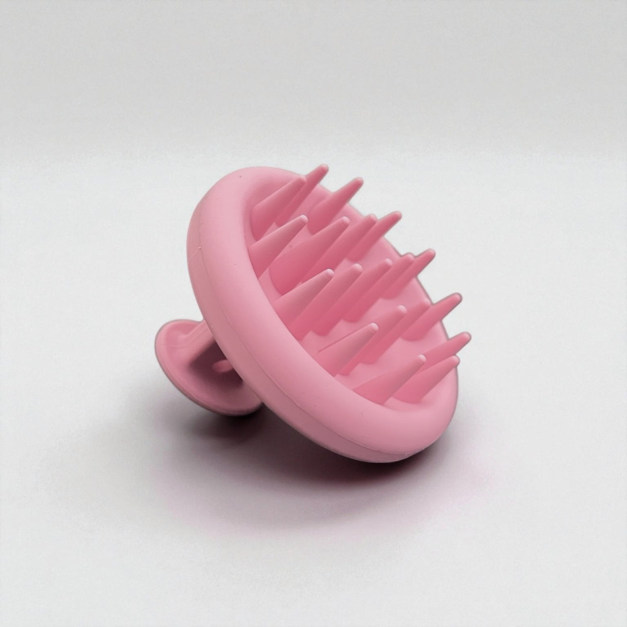 Brosse massante cuir chevelu