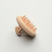 Brosse massante cuir chevelu